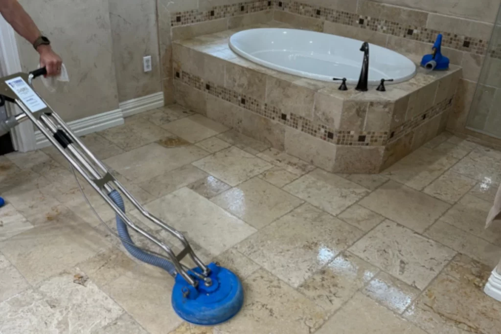 spacek travertine bathroom during floor cleaning